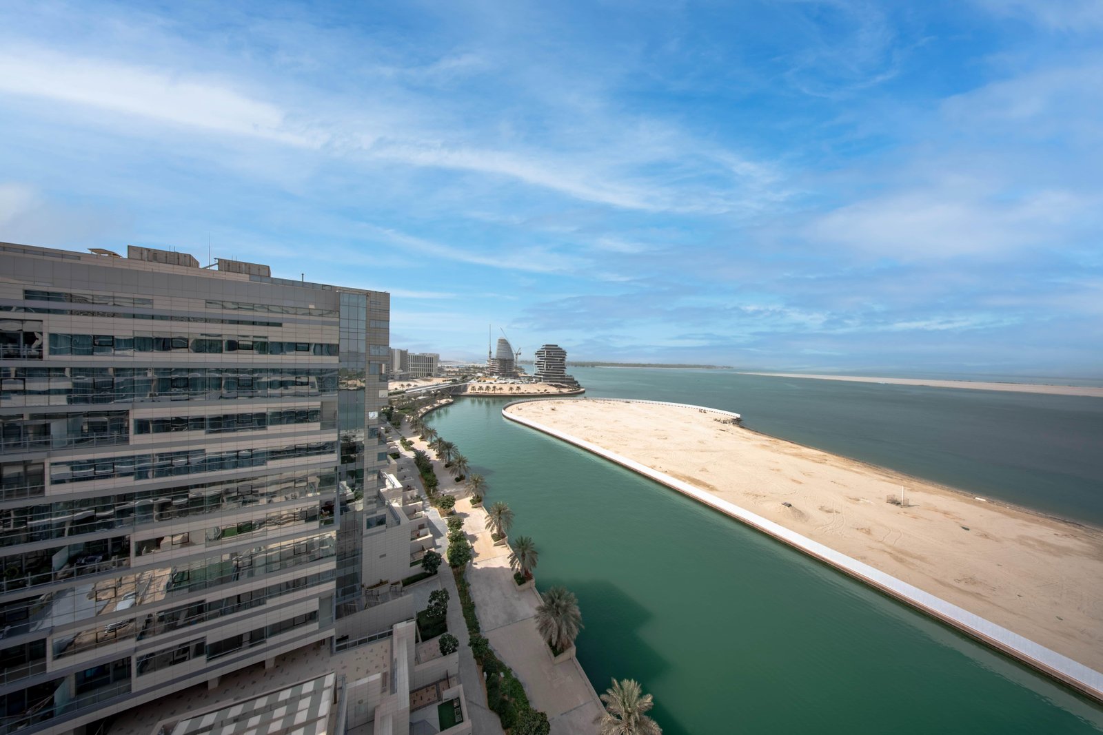 Architectural gallery image of Lamar Residences showcasing modern tower design, glass façades, and premium waterfront setting.